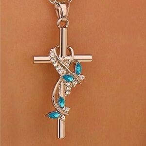Elegant Silver and Blue Cross Pendant Necklace